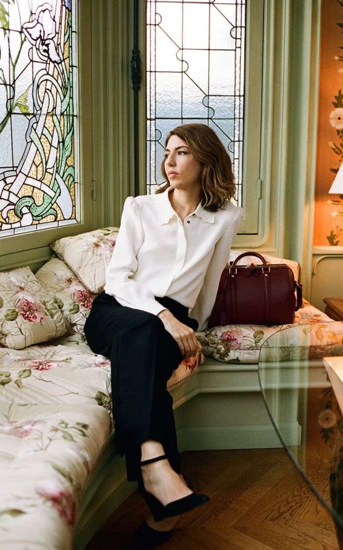 Sofia Coppola on a sofa